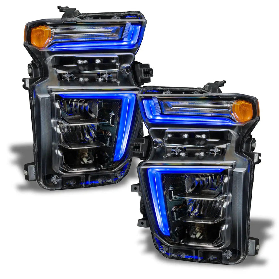 Chevrolet Silverado headlights with blue DRLs.