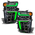 Chevrolet Silverado headlights with green DRLs.
