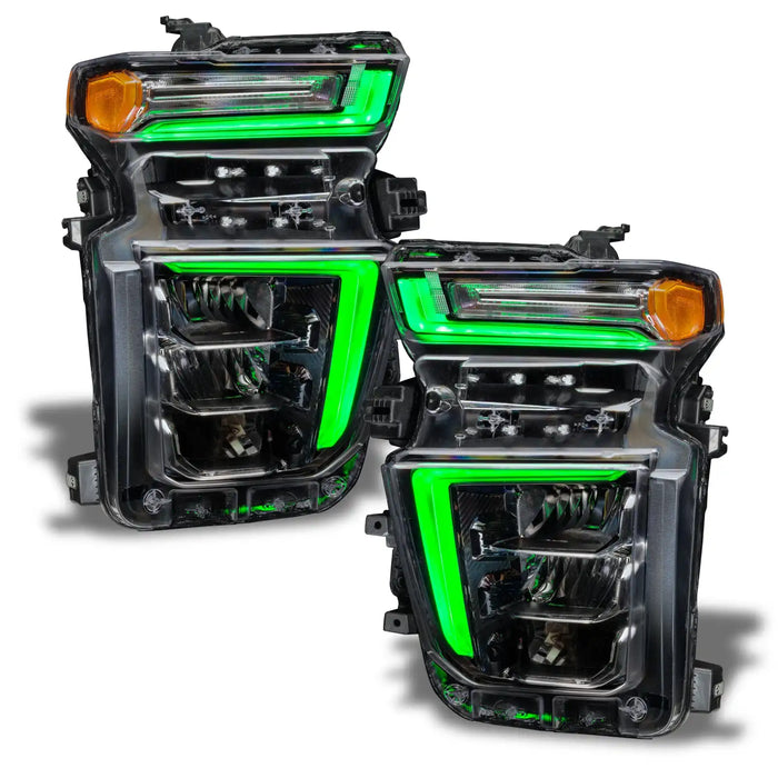 Chevrolet Silverado headlights with green DRLs.