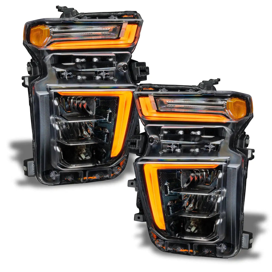 Chevrolet Silverado headlights with amber DRLs.