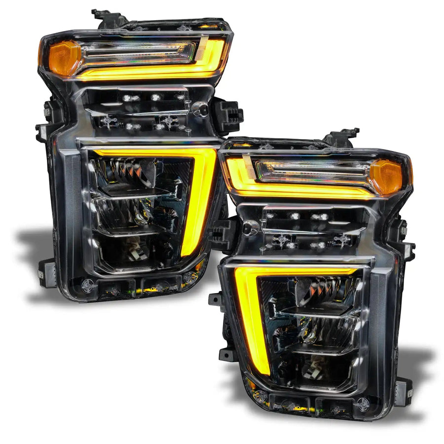 Chevrolet Silverado headlights with yellow DRLs.