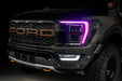 Front end of a Ford F-150 with pink headlight DRLs