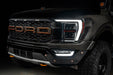 Front end of a Ford F-150 with white fog light DRLs