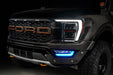 Front end of a Ford F-150 with cyan fog light DRLs