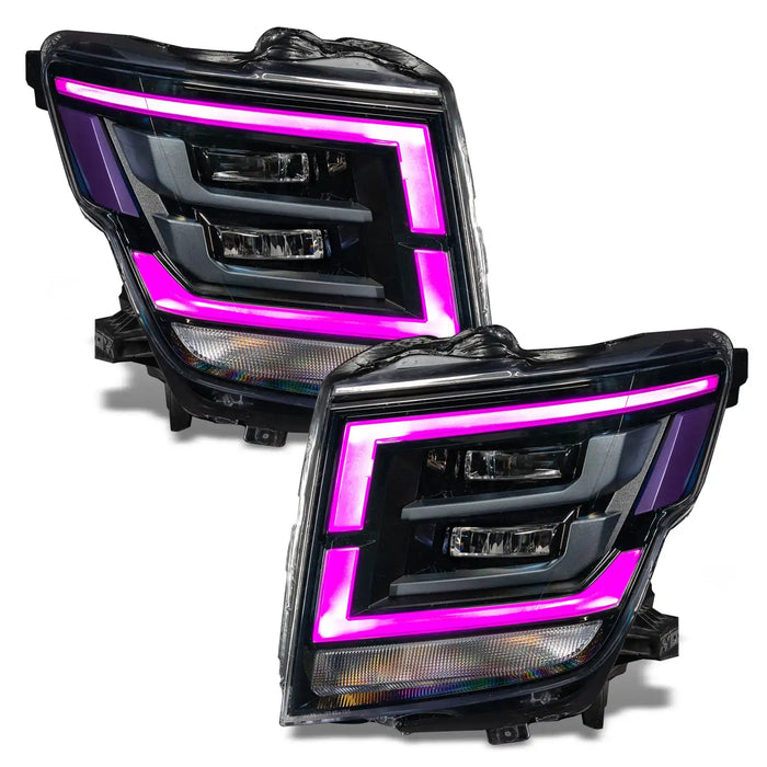 2021-2024 Nissan Titan headlights with pink DRLs.