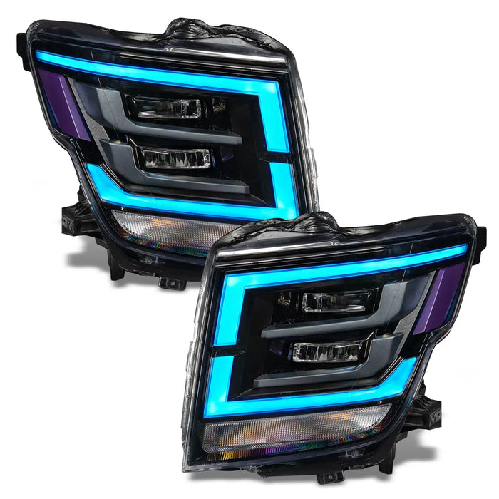 2021-2024 Nissan Titan headlights with cyan DRLs.