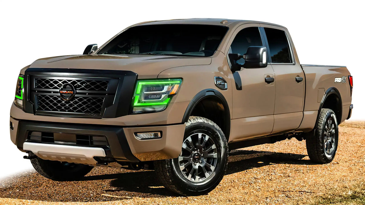 Brown Nissan Titan with green headlight DRLs.