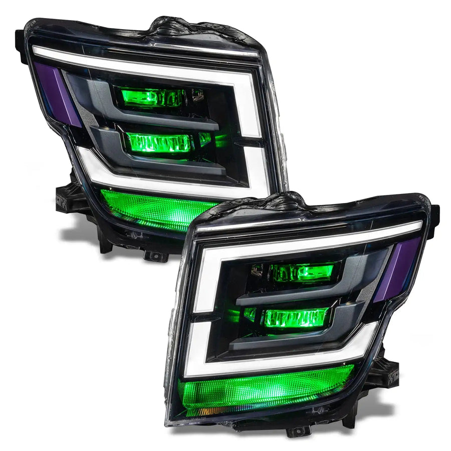 2021-2024 Nissan Titan headlights with green demon eye projectors.