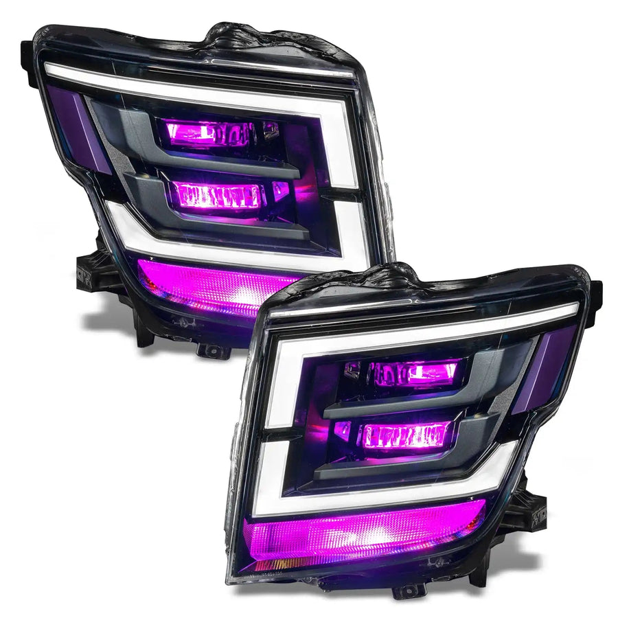 2021-2024 Nissan Titan headlights with pink demon eye projectors.