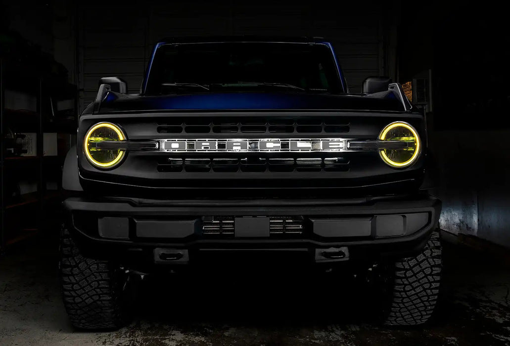 Front view of a Ford Bronco with yellow halo headlights.