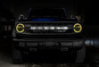Front view of a Ford Bronco with yellow halo headlights.