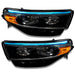 Ford Explorer headlights with cyan DRLs.