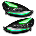 Tesla Model 3 headlights with green DRLs.
