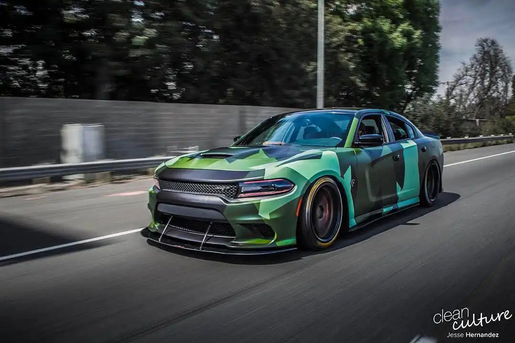 Dodge Charger rolling with ColorSHIFT RGB+W Headlight DRL Upgrade Kit installed.