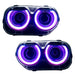 Dodge Challenger headlights with purple LED halo rings.