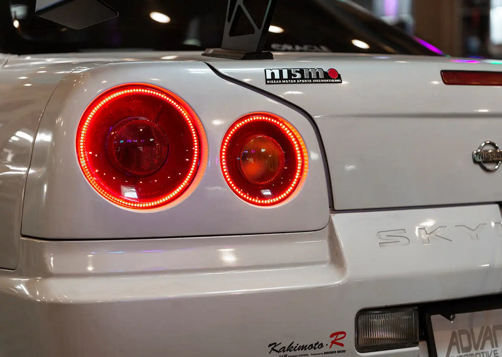 Close-up on the rear end of a Nissan Skyline with LED Tail Light Halo Rings installed.