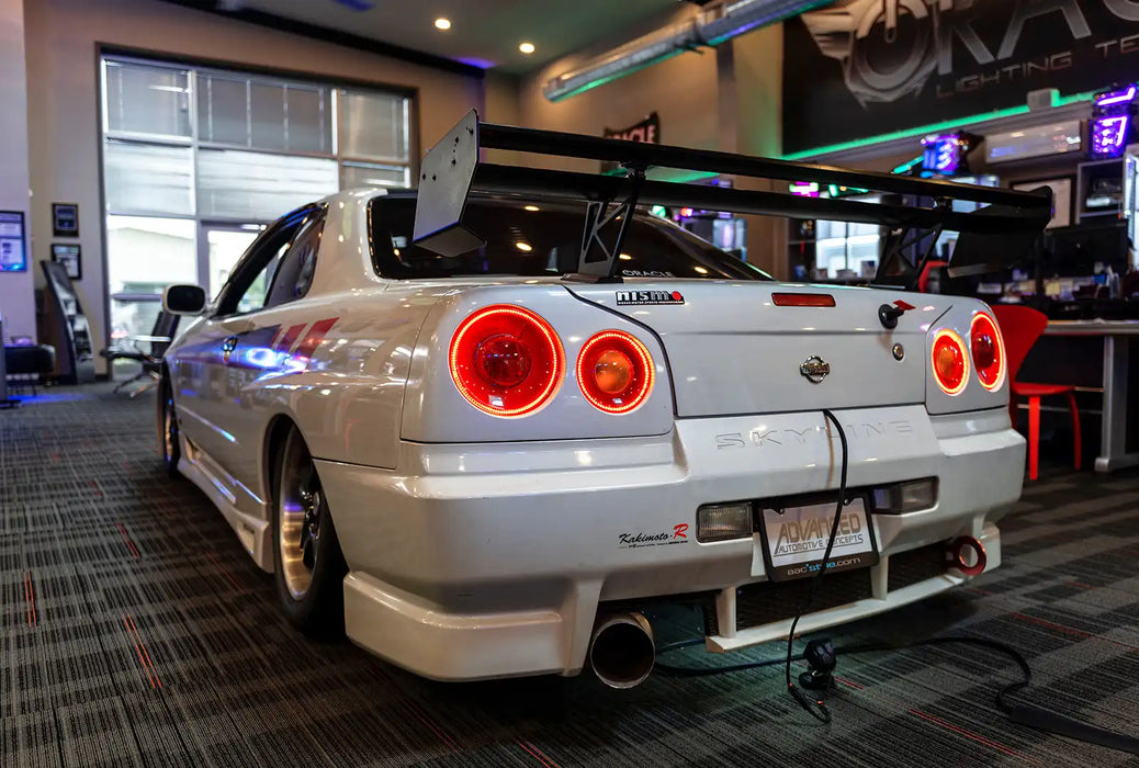 Close-up on the rear end of a Nissan Skyline with LED Tail Light Halo Rings installed.
