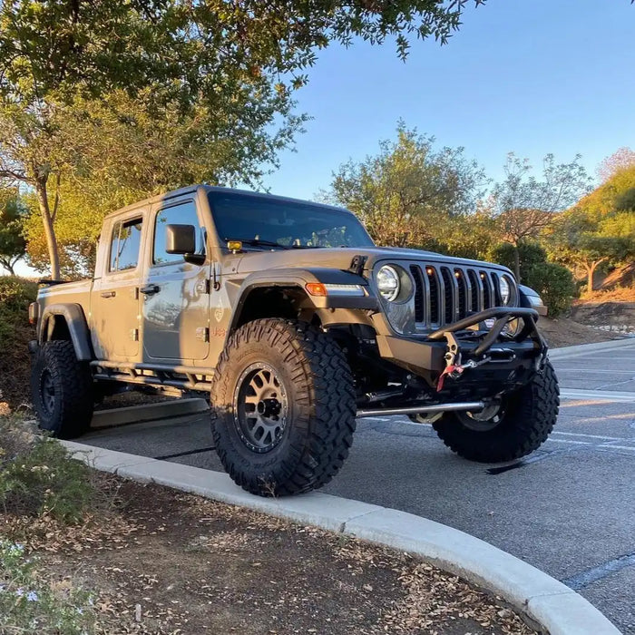 Three quarters view of a Jeep Wrangler with amber LED Grill Light Kit installed.