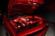 Red Challenger with red engine bay lighting.