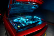 Red Challenger with cyan engine bay lighting.