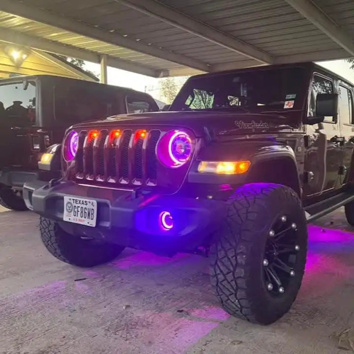 Three quarters view of a Jeep Wrangler JL, with ColorSHIFT Oculus Headlights installed.