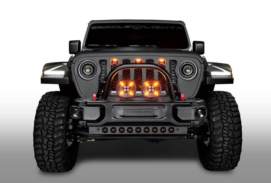 Front view of a Jeep with 7" Multifunction LED Spotlight set to amber LED.