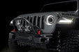 Front end of a Jeep equipped with 7" Multifunction LED Spotlights.