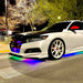 Honda outdoors with dynamic colorshift LED underbody kit installed.