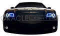 Front end of a Chrysler with white LED headlight and fog light halo rings installed.