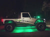 Side view of a Jeep with green LED rock lights.