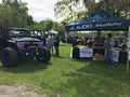Jeep Wrangler at a car meet with Vector Series Grill LED Halo Kit installed.