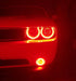 Close-up of challenger headlights with red halos
