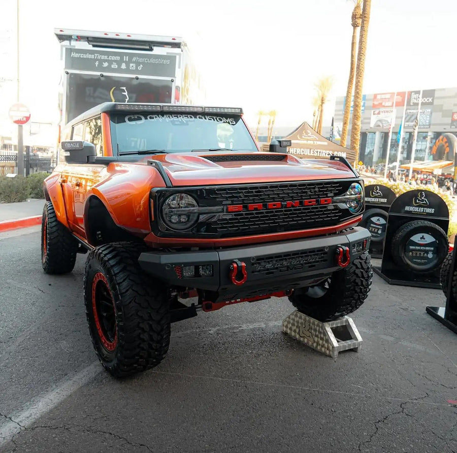 Cambered Customs Ford Bronco at a car show, equipped with LED Off-Road Side Mirrors and Magnet Covers.