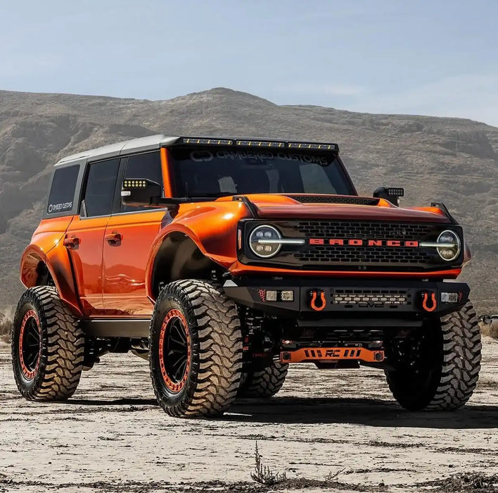 Three quarters view of Cambered Customs Ford Bronco in the desert with LED Off-Road Side Mirrors installed.