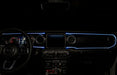 The dashboard of a Jeep with ColorSHIFT Fiber Optic LED Interior Kit installed, glowing white.