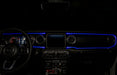 The dashboard of a Jeep with ColorSHIFT Fiber Optic LED Interior Kit installed, glowing blue.