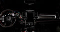 View of a RAM TRX dashboard from the backseat with white LED ambient lighting kit.
