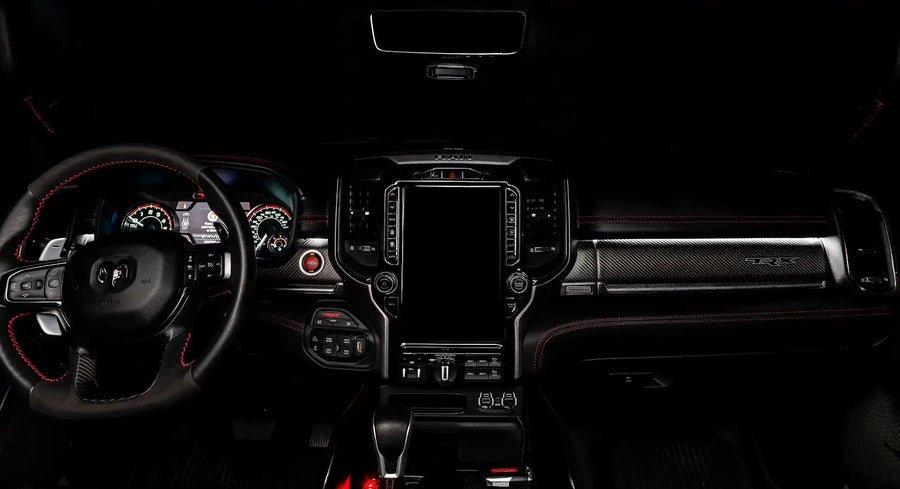 View of a RAM TRX dashboard from the backseat with white LED ambient lighting kit.