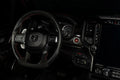Drivers side seat of a RAM TRX with white LED ambient lighting.