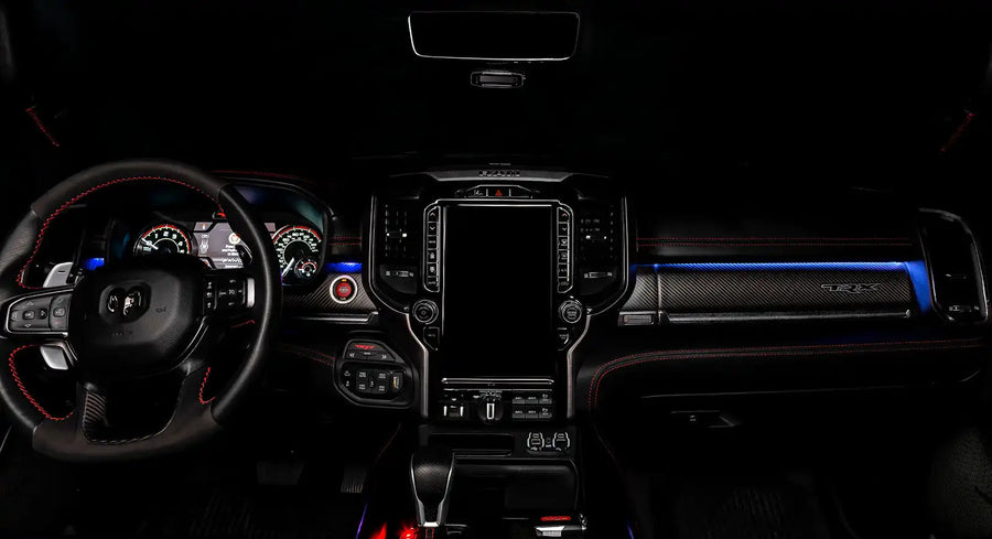 View of a RAM TRX dashboard from the backseat with blue LED ambient lighting kit.