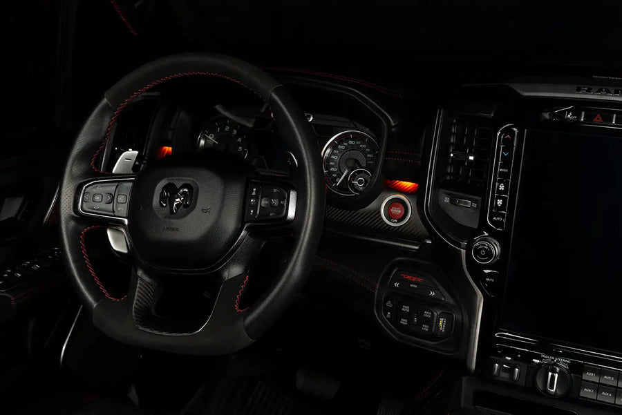 Drivers side seat of a RAM TRX with amber LED ambient lighting.