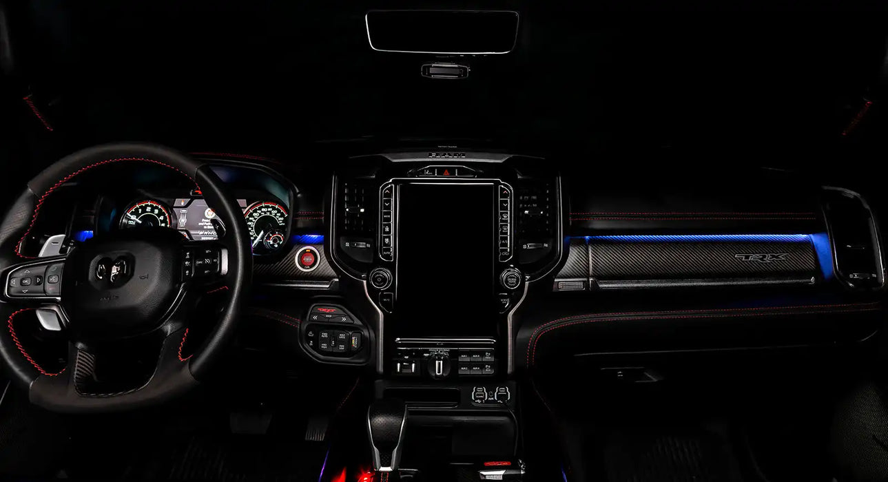 View of a RAM TRX dashboard from the backseat with blue LED ambient lighting kit.