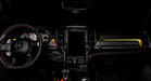View of a RAM TRX dashboard from the backseat with yellow LED ambient lighting kit.