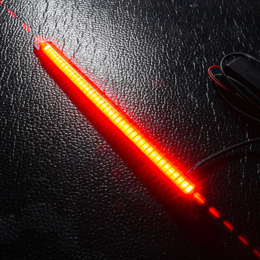 Linear Universal LED 3rd Brake Light (CHMSL) Module - Red displayed on a textured surface, highlighting its bright red blade design.