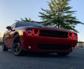 Red challenger with red headlight and fog light halos