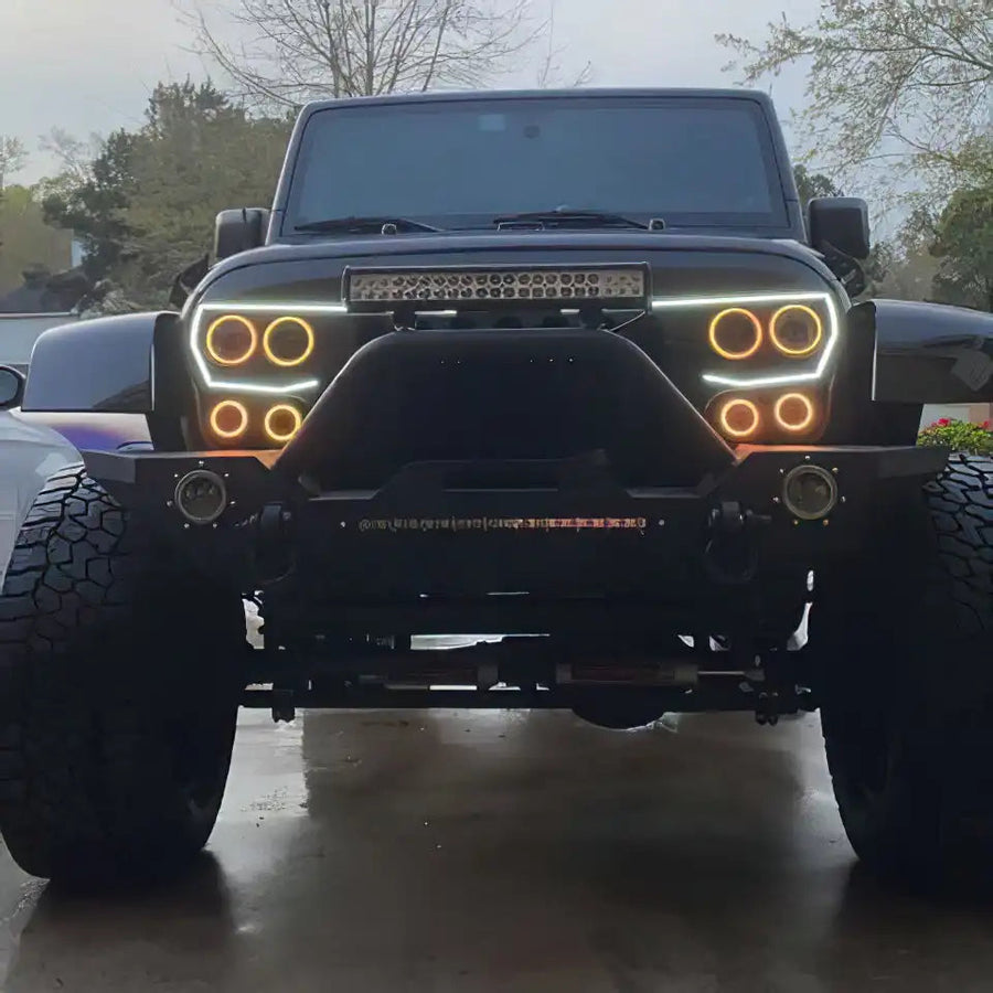 Front end of a Jeep Wrangler with Vector™ Series Grill LED Halo Kit installed.