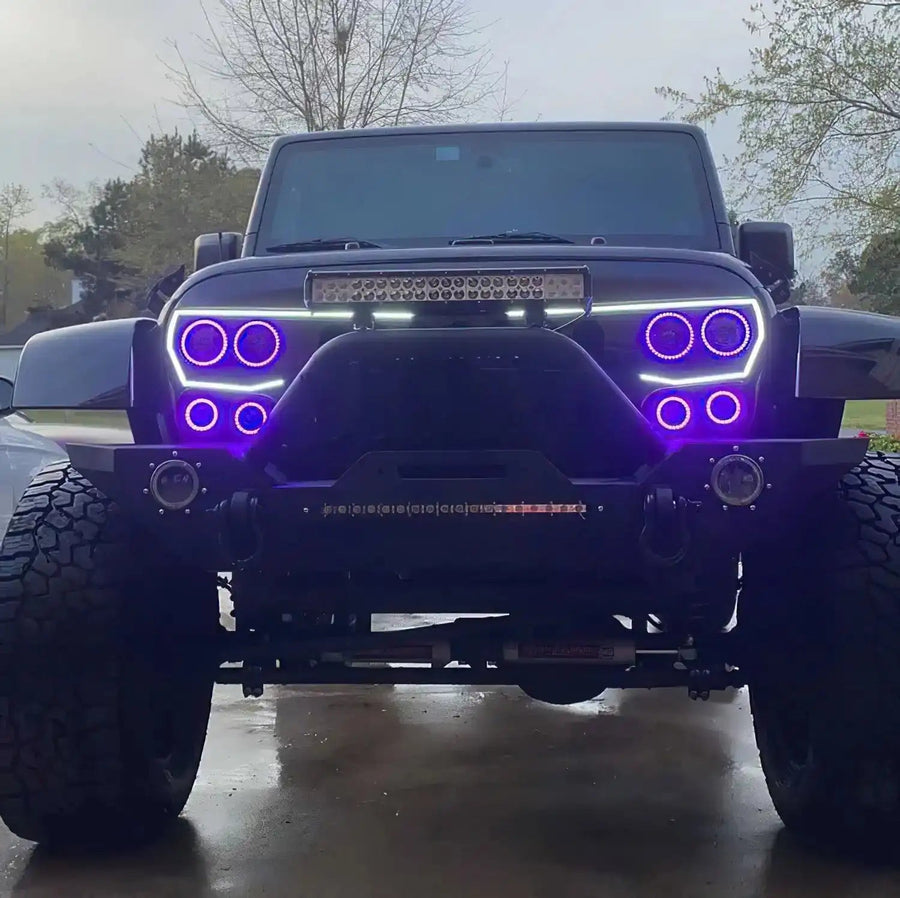 Front end of a Jeep Wrangler with Vector™ Series Grill LED Halo Kit installed.