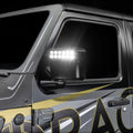 Close-up of a Jeep Wrangler JL equipped with LED Off-Road Side Mirrors turned on.
