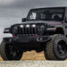Three quarters view of a black Jeep Gladiator JT with white Pre-Runner Style LED Grill Light Kit installed.