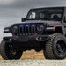 Three quarters view of a black Jeep Gladiator JT with blue Pre-Runner Style LED Grill Light Kit installed.